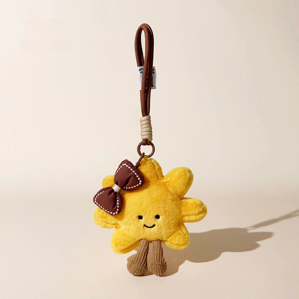 Sunflower Smile Plush Bag Charm - product image 2 showing the sunflower character bag charm