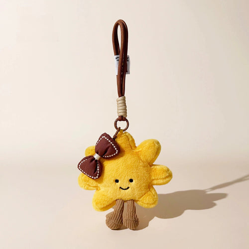Sunflower Smile Plush Bag Charm - product image 2 showing the sunflower character bag charm