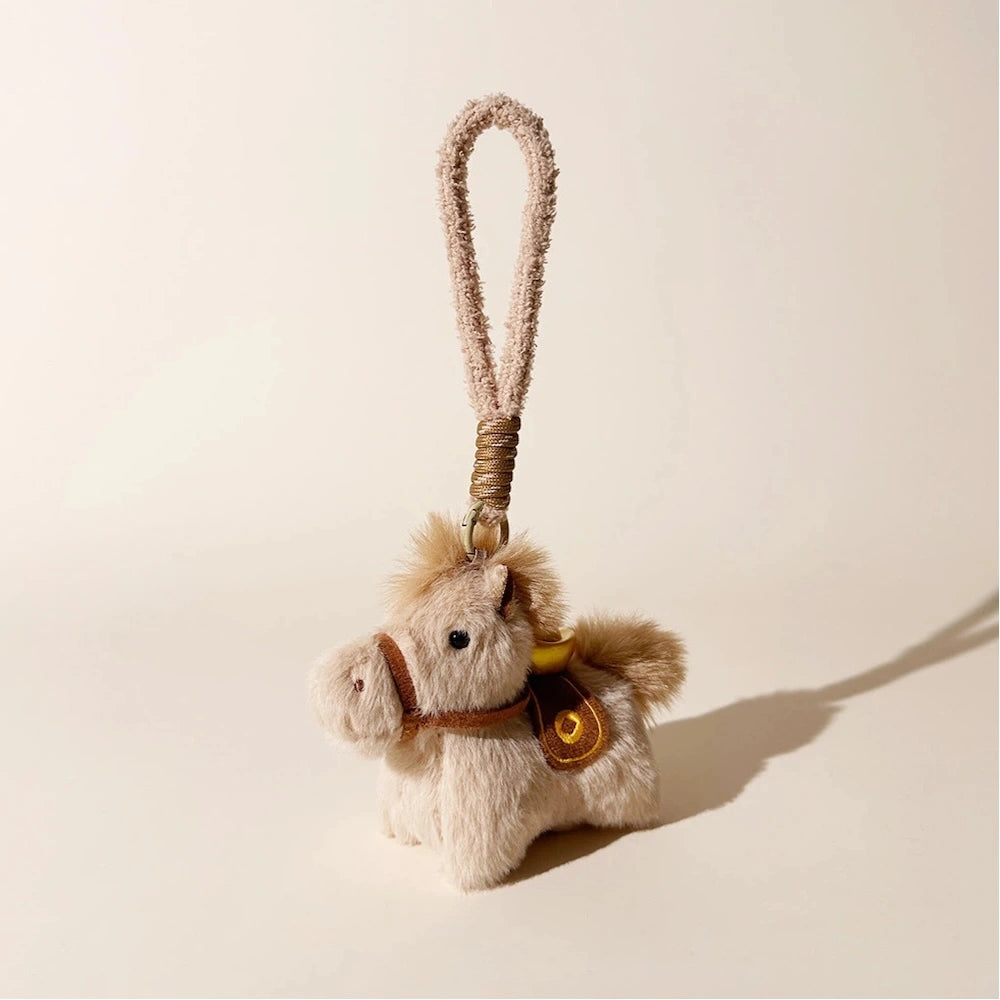 Lucky Pony Plush Bag Charm - product image 9 showing the pony bag charm