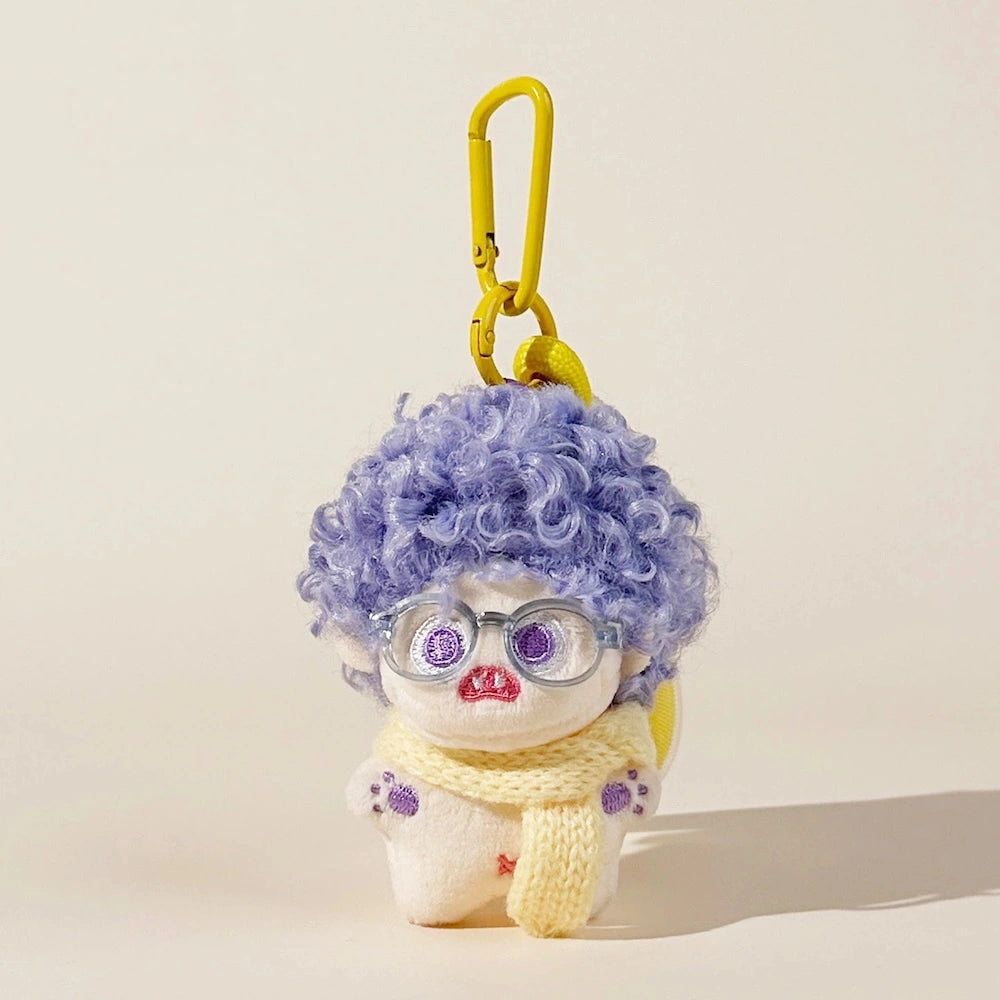 Fuzzy Doll Plush Bag Charm - product image 1 showing the fuzzy doll bag charm