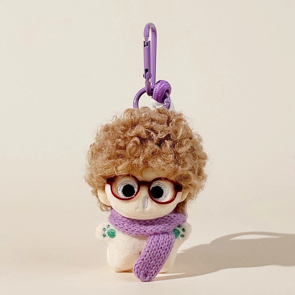 Fuzzy Doll Plush Bag Charm - product image 3 showing the fuzzy doll bag charm