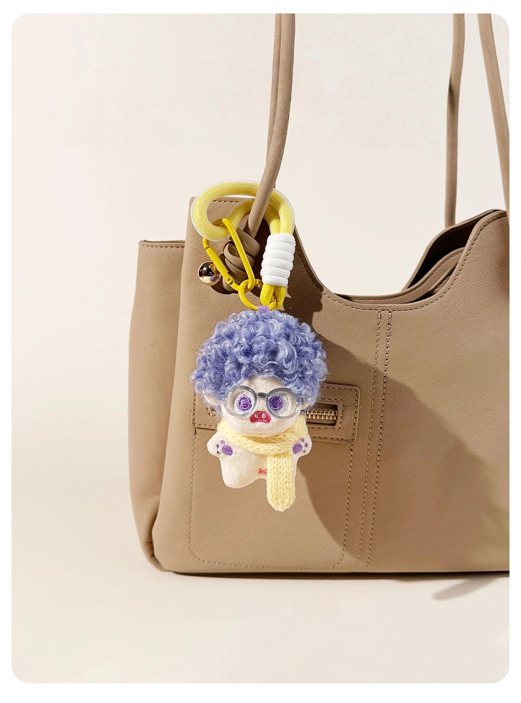 Fuzzy Doll Plush Bag Charm - product image 6 showing the fuzzy doll bag charm