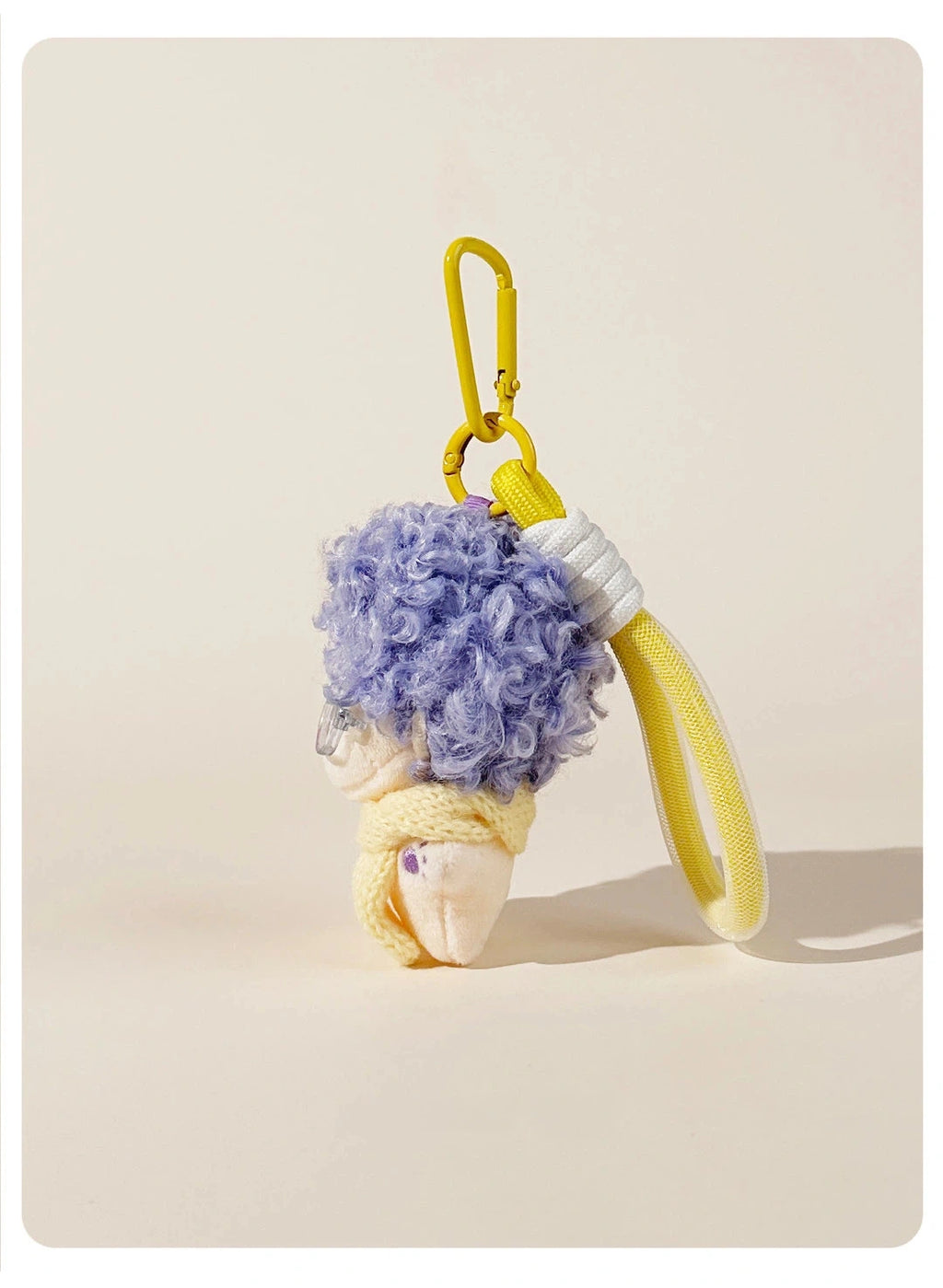Fuzzy Doll Plush Bag Charm - product image 8 showing the fuzzy doll bag charm