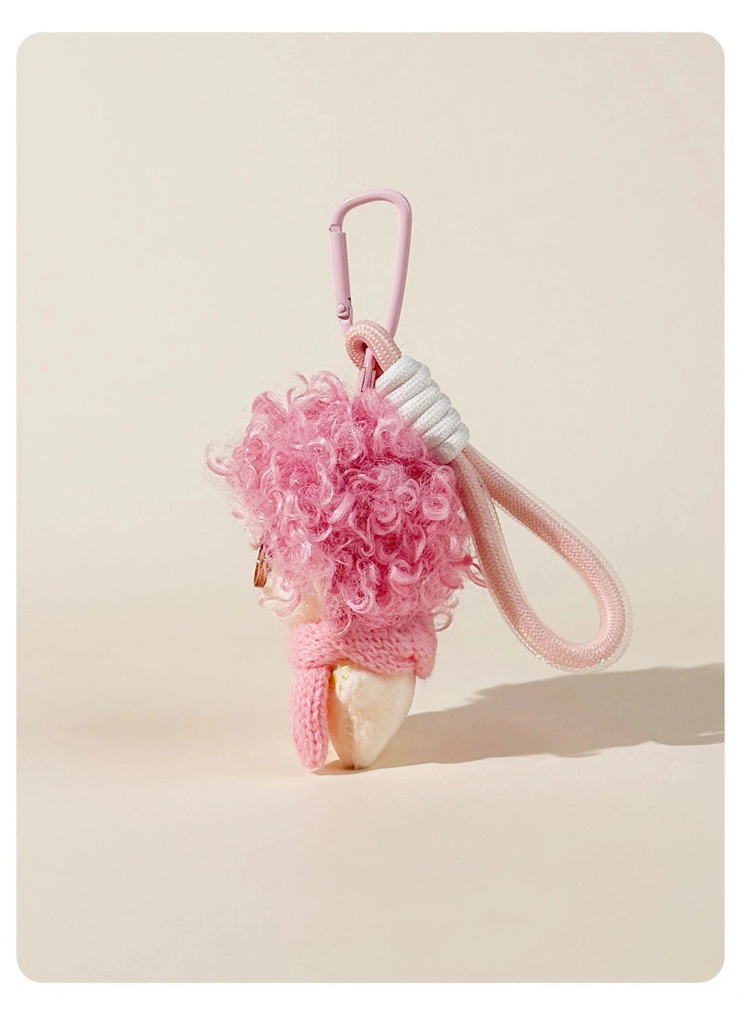 Fuzzy Doll Plush Bag Charm - product image 11 showing the fuzzy doll bag charm
