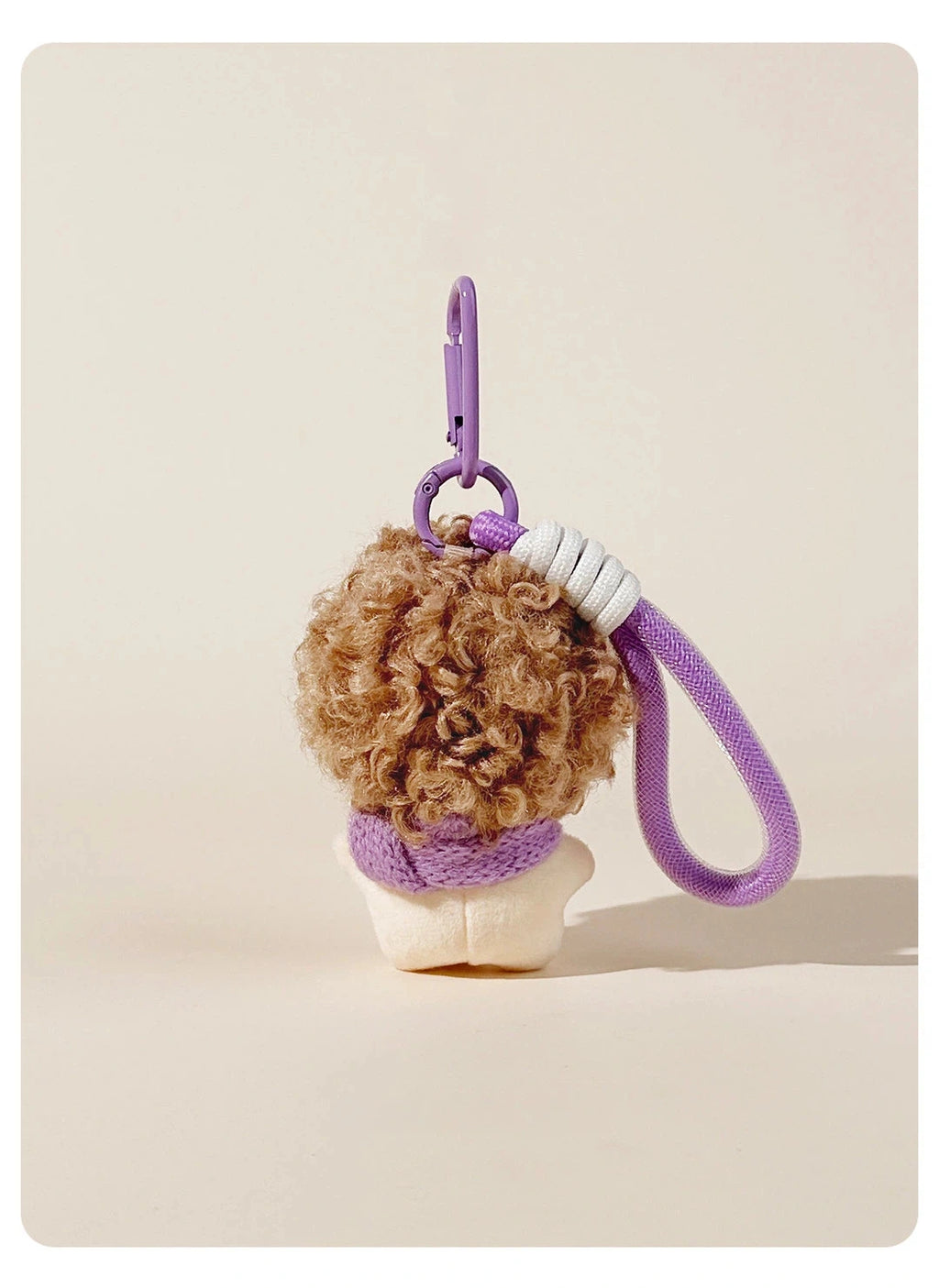 Fuzzy Doll Plush Bag Charm - product image 16 showing the fuzzy doll bag charm
