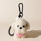 Round Puppy Plush Bag Charm - product image 1 showing the round puppy bag charm