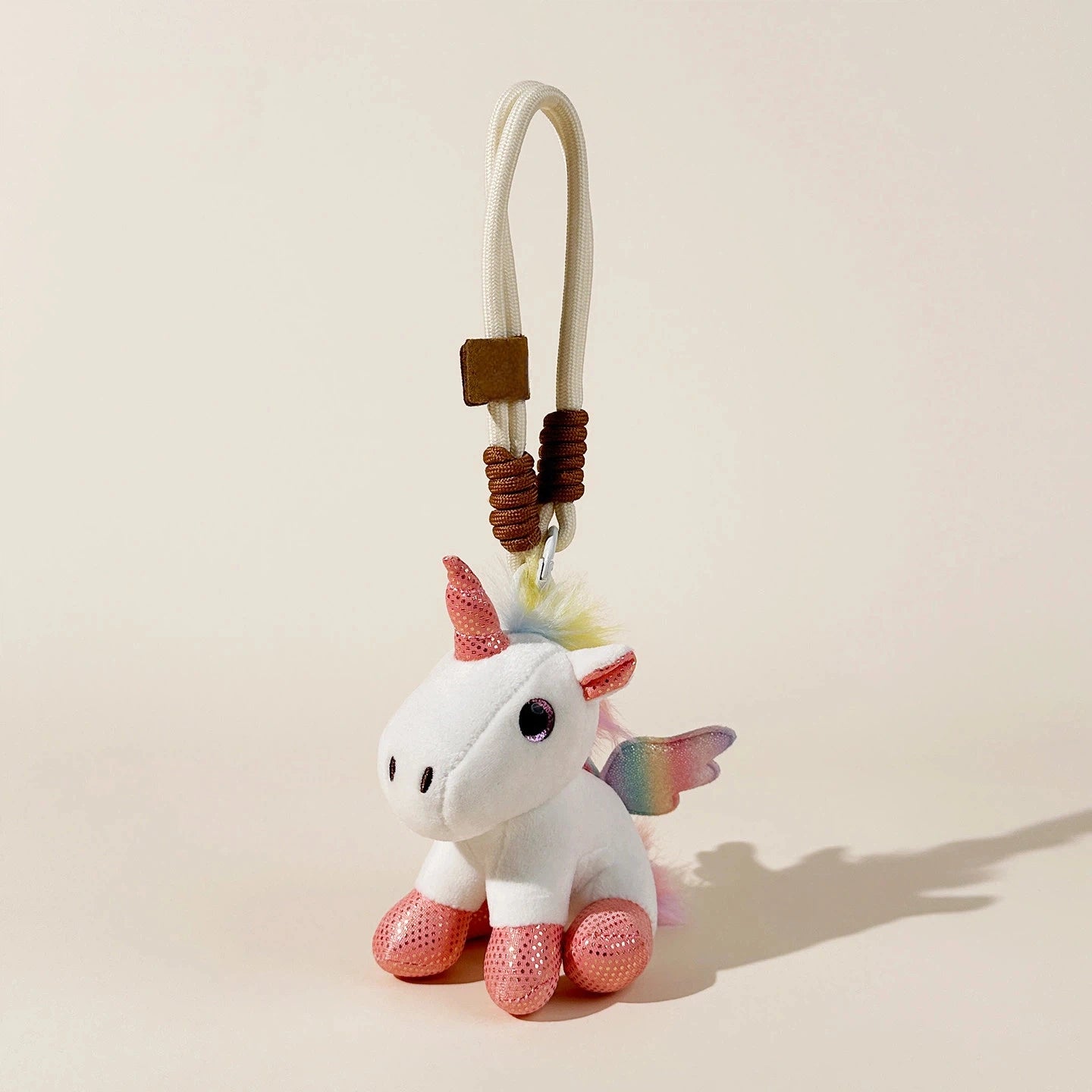 Pastel Unicorn Plush Bag Charm - product image 1 showing the pastel unicorn bag charm