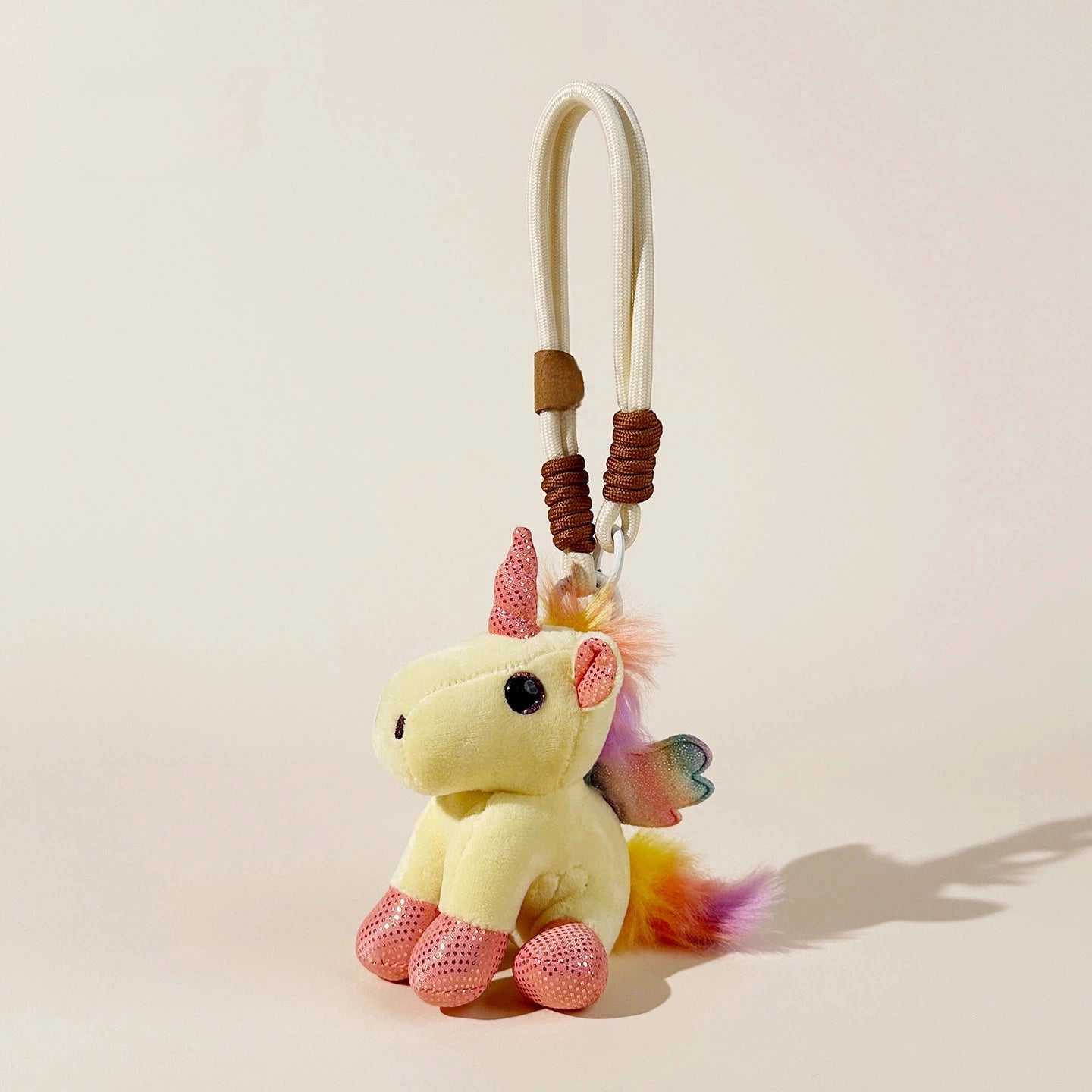 Pastel Unicorn Plush Bag Charm - product image 3 showing the pastel unicorn bag charm
