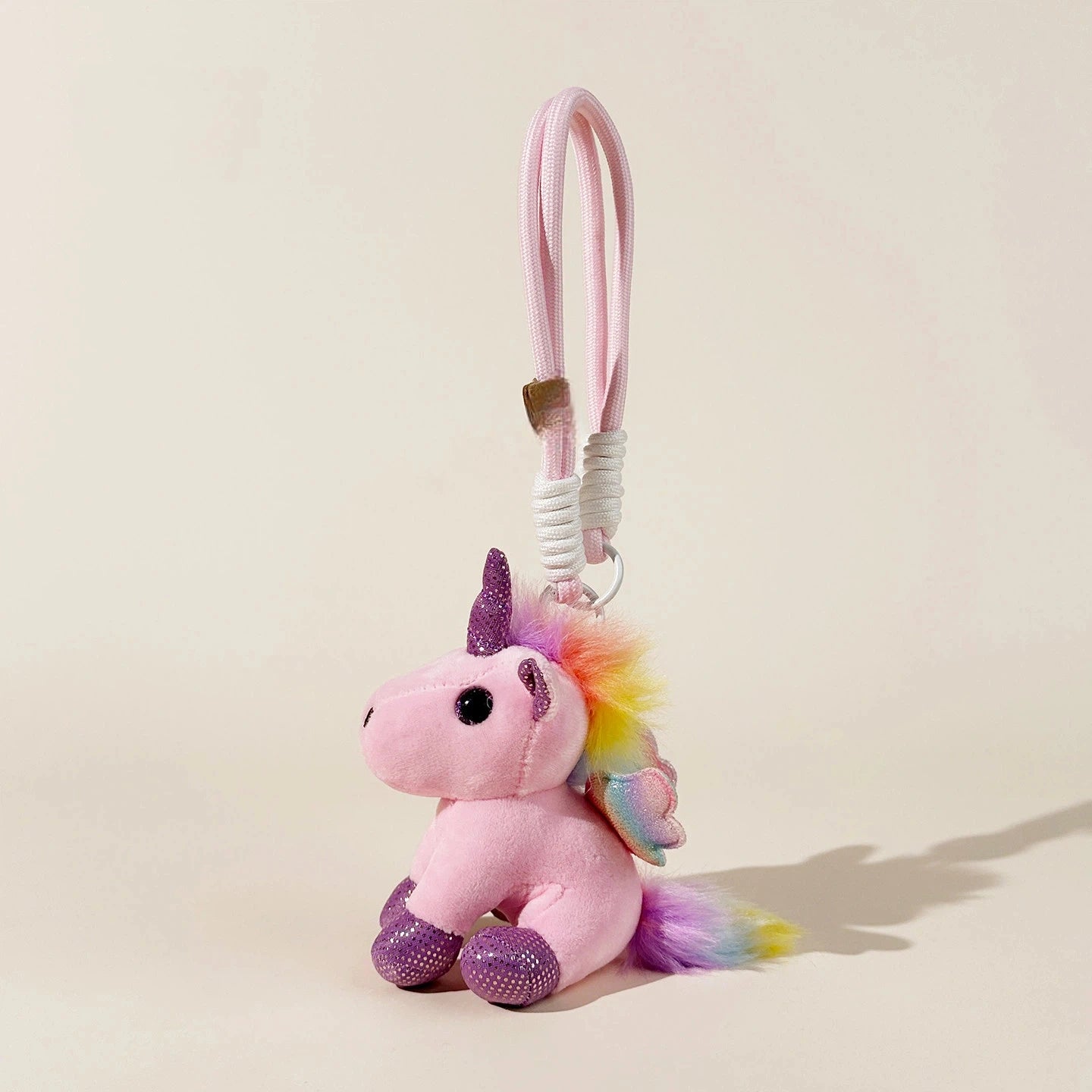 Pastel Unicorn Plush Bag Charm - product image 4 showing the pastel unicorn bag charm