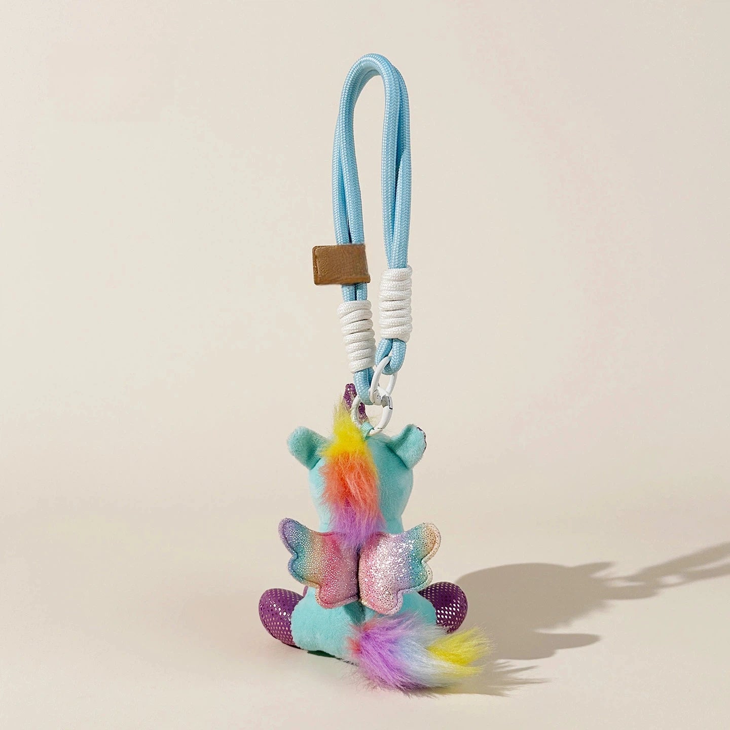 Pastel Unicorn Plush Bag Charm - product image 5 showing the pastel unicorn bag charm