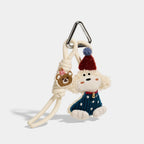 Birthday Puppy and Strawberry Girl Bag Charms close detail view showing tiny birthday mood