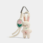 Pink and Blue Knitted Bunny Bag Charms angled product view showing knit bunny color pair