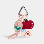 Apple House Storybook Bag Charms angled product view showing apple cottage cast