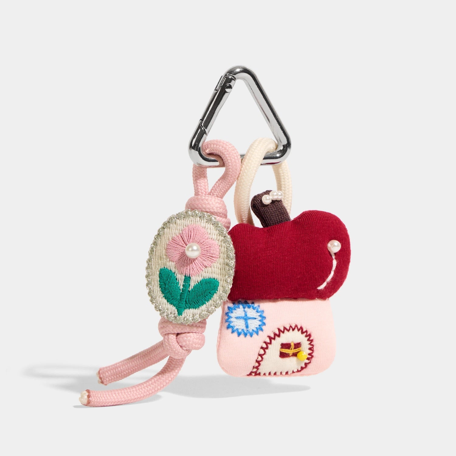 Apple House Storybook Bag Charms angled product view showing apple cottage cast