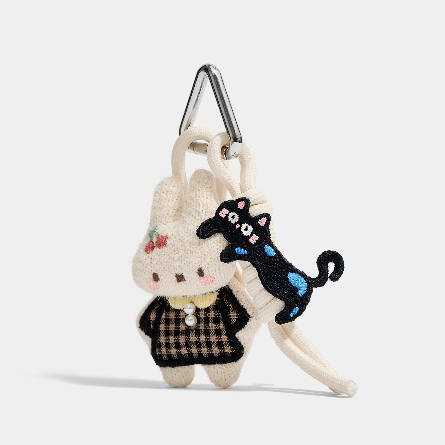 Plaid Bunny and Friends Bag Charms angled product view showing plaid campus character set