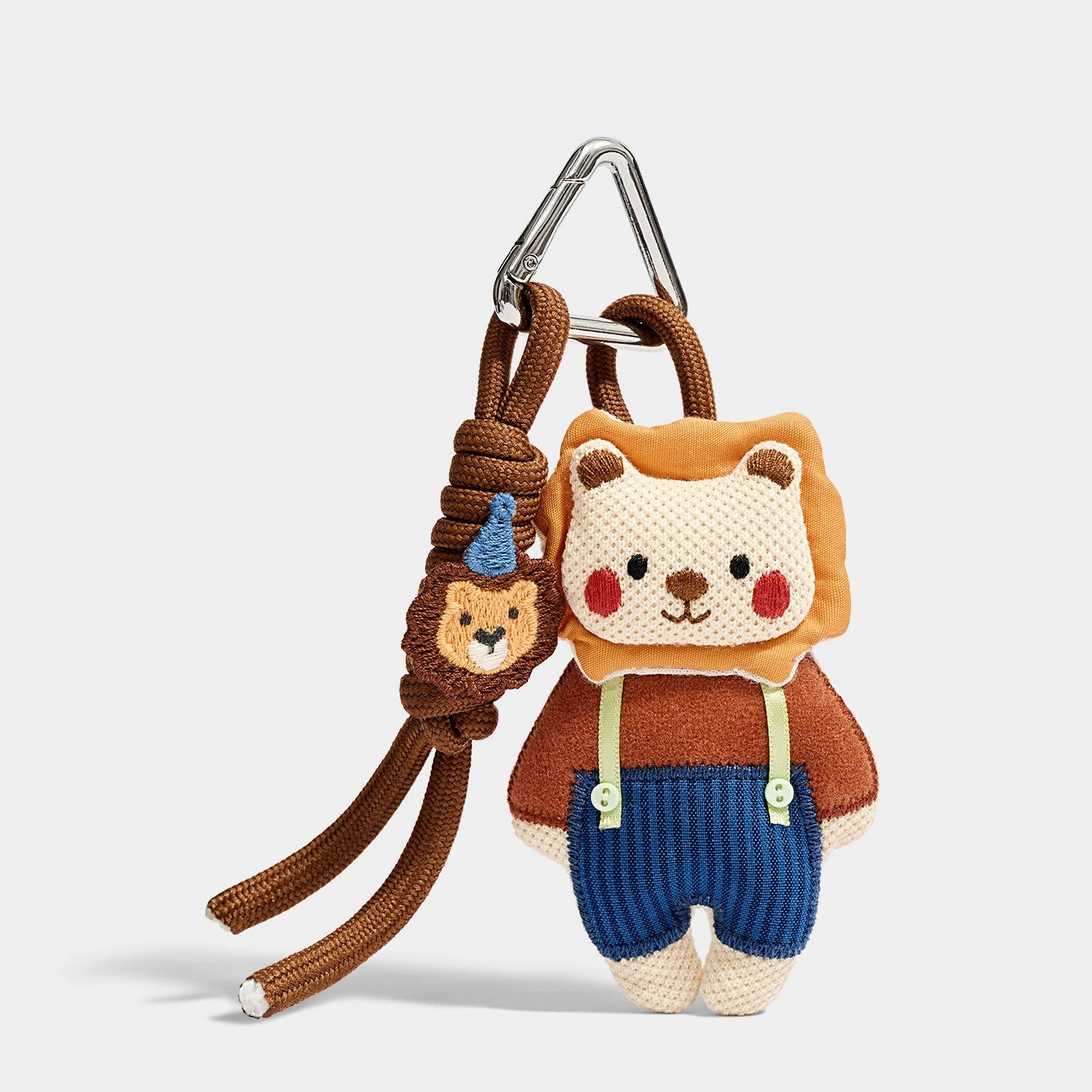 Denim Lion Bag Charm front product view showing denim-dressed lion