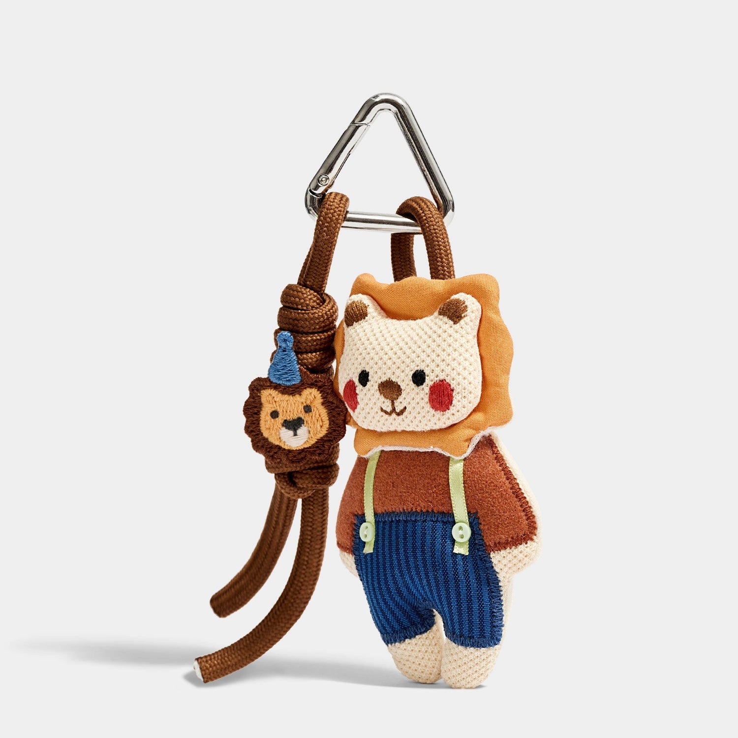 Denim Lion Bag Charm angled product view showing denim-dressed lion