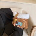 Party Hat Puppy Crossbody Bag with Curly-Textured Trim in Brown and White.