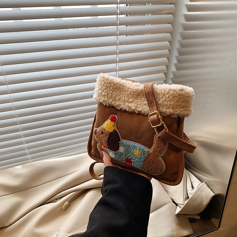 Party Hat Puppy Crossbody Bag with Curly-Textured Trim in Brown and Khaki.