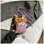 Wide-Eyed Knit Creature Crossbody Phone Pouch in Purple.