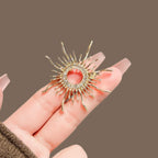 Sunburst Rhinestone Brooch product image showing sunburst star