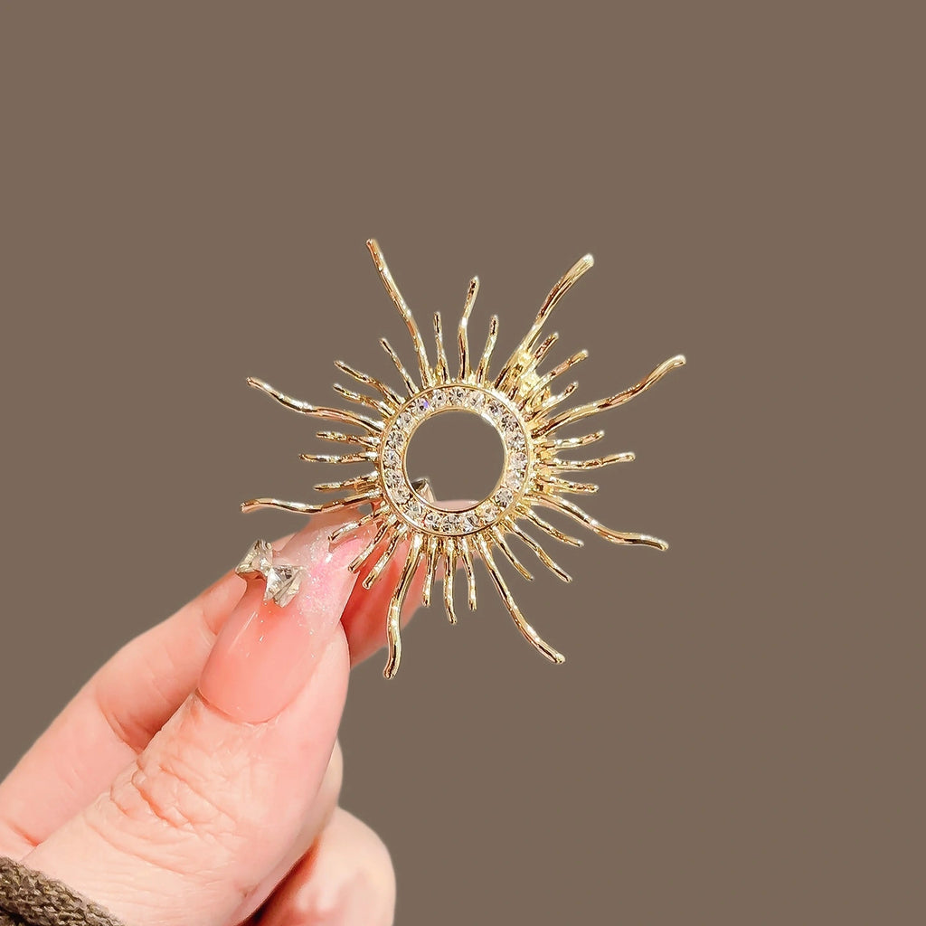 Sunburst Rhinestone Brooch product image showing sunburst star