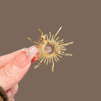 Sunburst Rhinestone Brooch product image showing sunburst star
