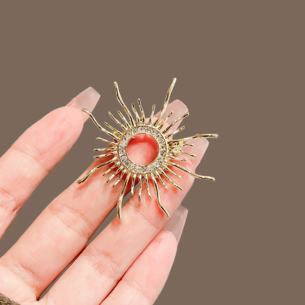 Sunburst Rhinestone Brooch product image showing sunburst star