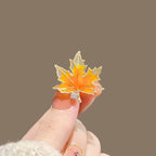 Maple and Ginkgo Leaf Brooch product image showing autumn leaves