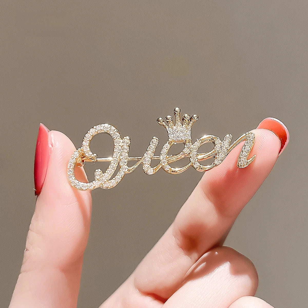 Crown Letter Brooch variant image showing gold crown letter brooch