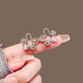 Hollow Flower Waist Tightener Pin variant image showing silver hollow flower waist pin