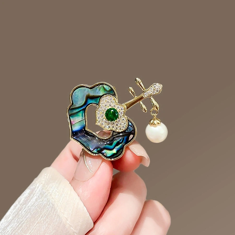 Mother-of-Pearl Ruyi Brooch product image showing ruyi and shell motifs