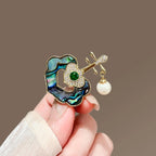 Mother-of-Pearl Ruyi Brooch product image showing ruyi and shell motifs