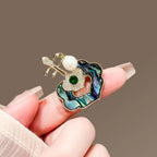 Mother-of-Pearl Ruyi Brooch product image showing ruyi and shell motifs