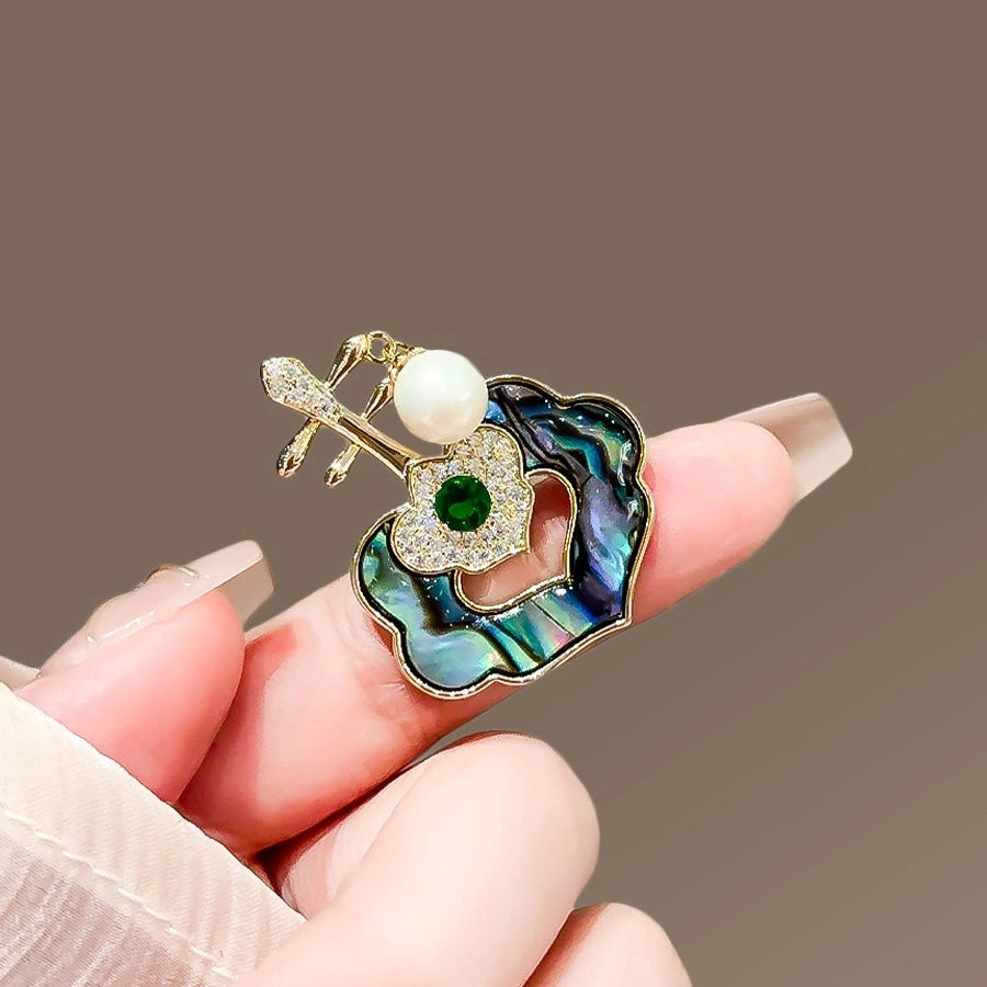 Mother-of-Pearl Ruyi Brooch product image showing ruyi and shell motifs