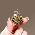 Mother-of-Pearl Ruyi Brooch product image showing ruyi and shell motifs