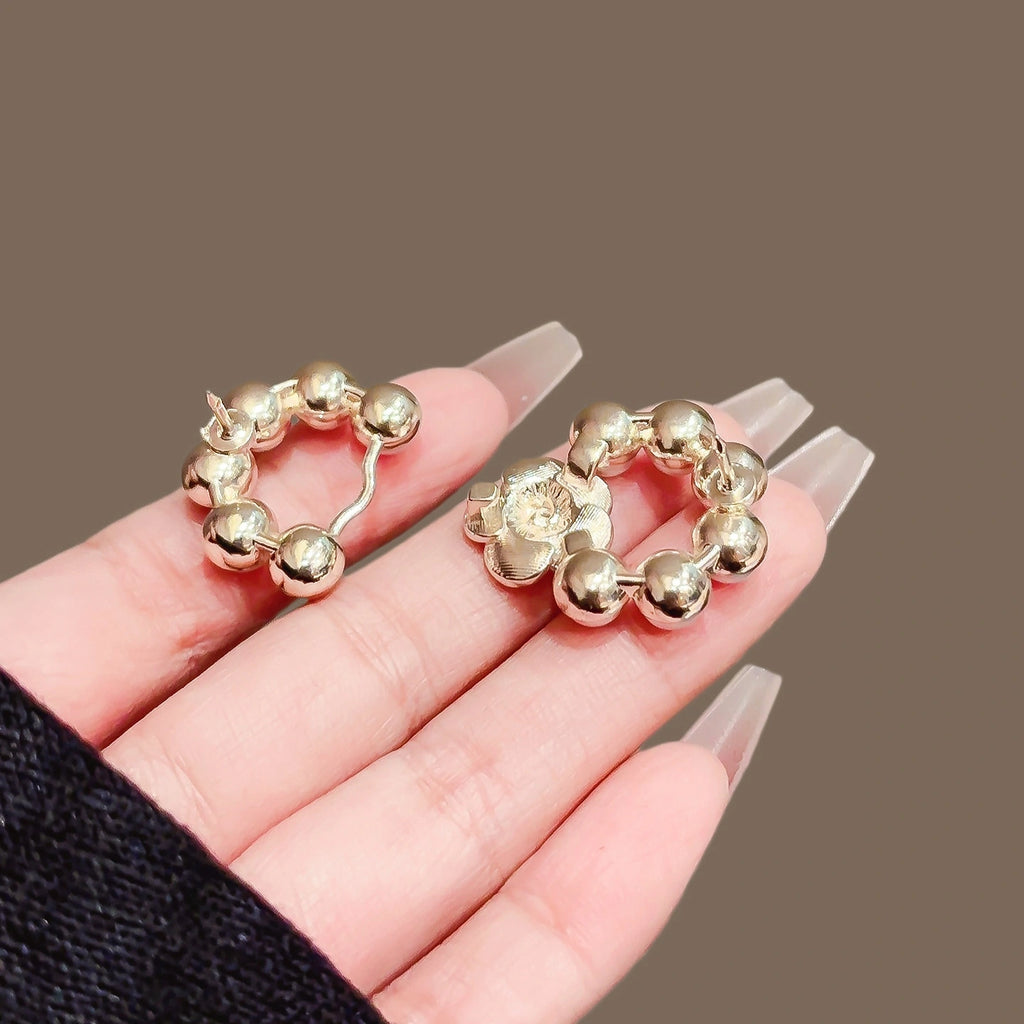 Pearl Camellia Waist Tightener Pin product image showing camellia flower