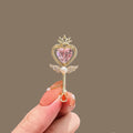 Pink brooch variant image