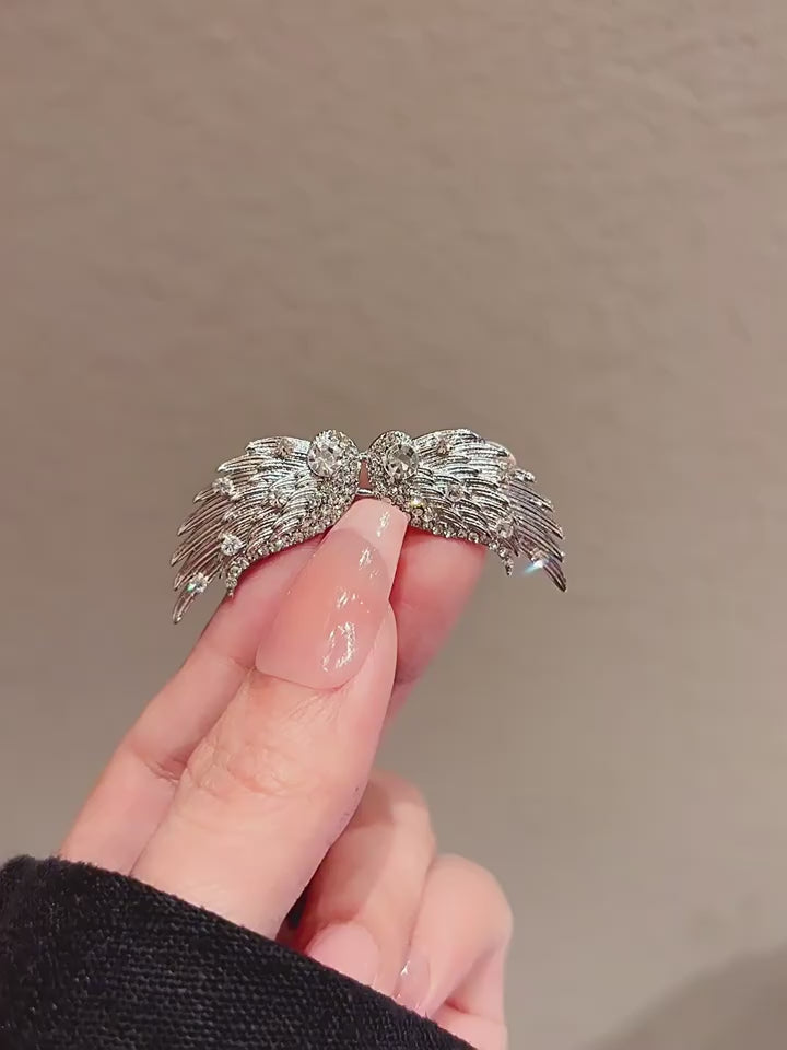 Angel Wing Waist Tightener Pin video showing the angel wings accessory