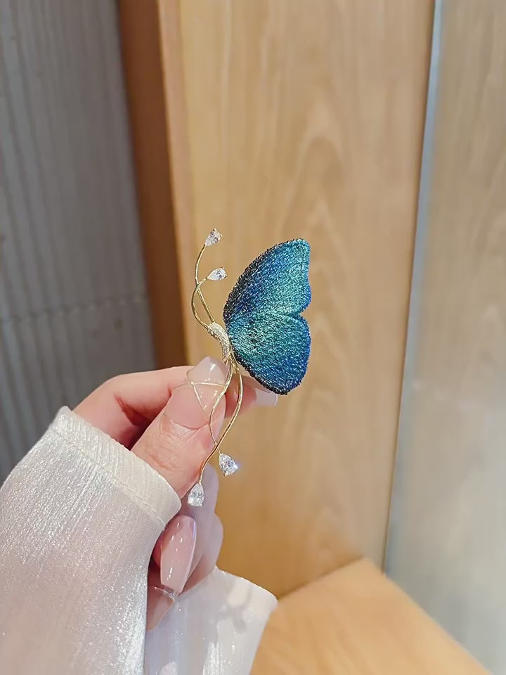 Blue Embroidered Butterfly Brooch video showing the blue butterfly accessory