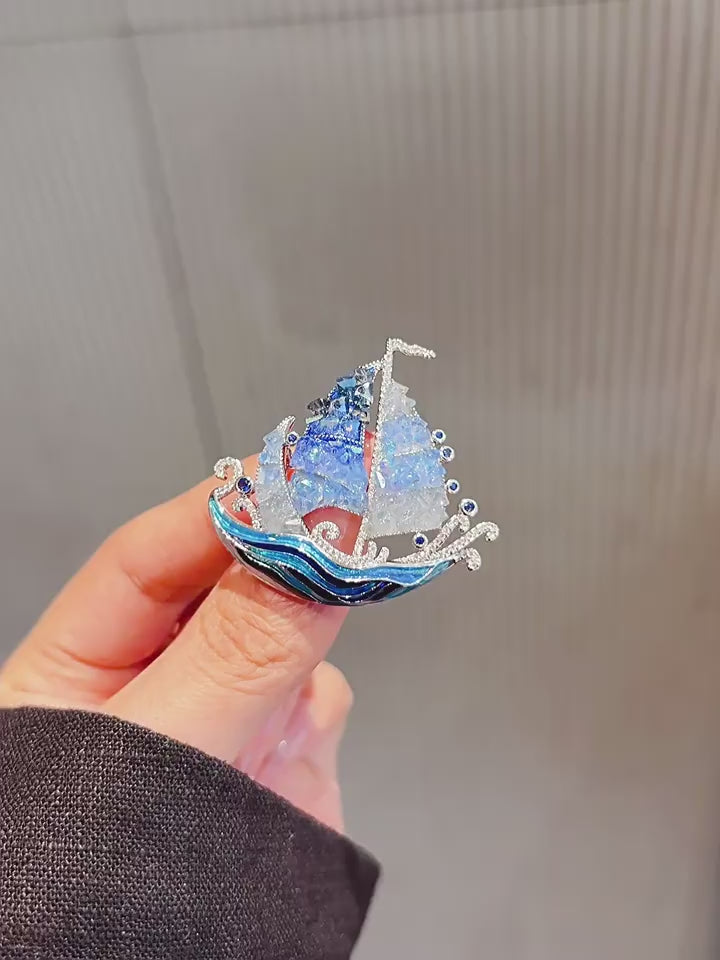 Blue Crystal Sailboat Brooch video showing the crystal sailboat accessory