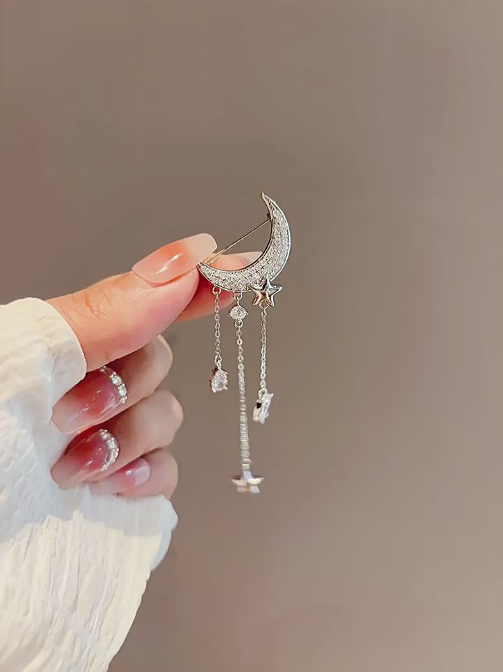 Star Moon Tassel Brooch video showing the star and moon accessory