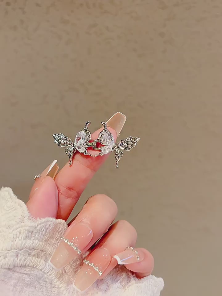Rhinestone Butterfly Waist Tightener Pin video showing the butterfly accessory